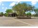 Community center with well-manicured landscaping and ample parking at 43884 W Kramer Ln, Maricopa, AZ 85138
