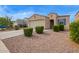 Single-story house featuring desert landscaping with a well-maintained front yard and a two-car garage at 4424 W Vervain Ave, San Tan Valley, AZ 85144