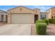 Charming single-story home with a two-car garage and low-maintenance desert landscaping at 4424 W Vervain Ave, San Tan Valley, AZ 85144