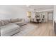Open floor plan with living room, dining area, and a glimpse of the kitchen at 4424 W Vervain Ave, San Tan Valley, AZ 85144