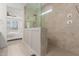 Modern tile shower featuring glass enclosure, shower head and separate temperature controls at 5330 W Thresher Way, Laveen, AZ 85339