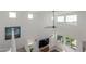 Bright living room with natural light and white railing overlooking the living room below at 5330 W Thresher Way, Laveen, AZ 85339