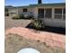 View of the backyard with brick steps at 5342 E Des Moines St, Mesa, AZ 85205
