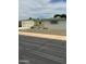 Ranch-style home with large front yard, desert landscaping, and two-car garage at 5342 E Des Moines St, Mesa, AZ 85205