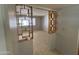 Open floorplan showcasing a living room area, ideal for Gathering gatherings and relaxing, with tile flooring at 5342 E Des Moines St, Mesa, AZ 85205