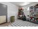 Well-organized storage room with shelving and ample space for storage needs at 701 N 55Th Pl, Mesa, AZ 85205