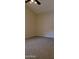 This bedroom features neutral walls and a carpeted floor at 7825 W Crocus Dr, Peoria, AZ 85381