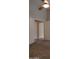 Spacious bedroom featuring neutral carpet, a ceiling fan, and a walk-in closet for ample storage at 7825 W Crocus Dr, Peoria, AZ 85381