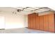 Spacious garage with ample cabinet storage and a clean, organized layout at 7825 W Crocus Dr, Peoria, AZ 85381