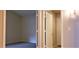Hallway showcasing multiple doorways and providing seamless connectivity throughout the home at 7825 W Crocus Dr, Peoria, AZ 85381