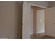 Hallway with closet and bathroom entryway at 7825 W Crocus Dr, Peoria, AZ 85381