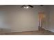 Inviting living space with open doorway and carpeted floors at 7825 W Crocus Dr, Peoria, AZ 85381