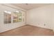 Neutral bedroom featuring carpet floors, and windows for natural light at 8140 N 107Th Ave # 287, Peoria, AZ 85345