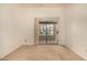 Bedroom with carpet floors and glass sliding doors opening to the outdoors at 8140 N 107Th Ave # 287, Peoria, AZ 85345