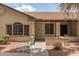 Charming single-story home featuring a landscaped front yard with desert landscaping, textured stucco, and a covered entryway at 8140 N 107Th Ave # 287, Peoria, AZ 85345