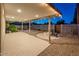 Spacious backyard featuring fire pit, covered patio, and access to a refreshing pool at 8408 E Rancho Vista Dr, Scottsdale, AZ 85251