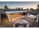 Overhead view of backyard featuring pool, patio and fire pit at 8408 E Rancho Vista Dr, Scottsdale, AZ 85251