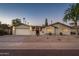 Charming single-story home with desert landscaping, a paver driveway, and inviting curb appeal at 8408 E Rancho Vista Dr, Scottsdale, AZ 85251