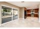 Open floor plan showcasing the modern kitchen and easy access to outdoor patio area with views of fire pit at 8408 E Rancho Vista Dr, Scottsdale, AZ 85251