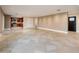 A bright, expansive living area with open access to the kitchen and stylish tile flooring throughout at 8408 E Rancho Vista Dr, Scottsdale, AZ 85251