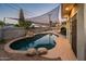 Inviting backyard pool area shaded by sail at 8408 E Rancho Vista Dr, Scottsdale, AZ 85251