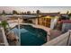 Backyard pool and patio area with sail shade at 8408 E Rancho Vista Dr, Scottsdale, AZ 85251