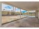 Spacious covered patio overlooks a large backyard with a block wall and a fenced-in pool area at 11021 N 55Th Dr, Glendale, AZ 85304