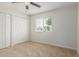 Bedroom with carpet and large windows that let in ample natural light at 11021 N 55Th Dr, Glendale, AZ 85304