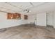 Spacious garage features shelving and storage cabinets for tools and equipment at 11021 N 55Th Dr, Glendale, AZ 85304