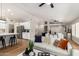 Bright open living area flows into modern kitchen with island seating, neutral colors and lots of light at 1114 N Leland Ct, Gilbert, AZ 85233
