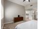 This main bedroom features neutral tones, ceiling fan and ensuite bathroom at 1114 N Leland Ct, Gilbert, AZ 85233
