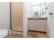 Bathroom featuring shower with updated fixtures, toilet and vanity at 113 N Albert Dr, Chandler, AZ 85226