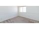 Standard carpeted bedroom featuring neutral paint and a standard window at 113 N Albert Dr, Chandler, AZ 85226