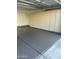Garage features epoxy flooring and plenty of built in storage cabinets at 113 N Albert Dr, Chandler, AZ 85226