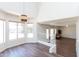 Bright living area with high ceilings, wood floors, and natural light from large windows at 113 N Albert Dr, Chandler, AZ 85226