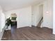 Spacious living area with hardwood floors and stairs leading to the second floor at 113 N Albert Dr, Chandler, AZ 85226