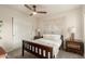 Bedroom featuring neutral decor, ceiling fan, and matching nightstands at 12866 W Orange Dr, Litchfield Park, AZ 85340