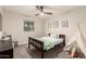 Cozy bedroom featuring a playful teepee, ceiling fan, and window at 12866 W Orange Dr, Litchfield Park, AZ 85340