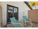 Private patio with outdoor seating area and access to the main house at 12866 W Orange Dr, Litchfield Park, AZ 85340