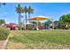 Neighborhood playground featuring shade and green grass at 13170 W Clarendon Ave, Litchfield Park, AZ 85340