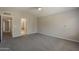 Large bedroom featuring neutral paint, carpet flooring, and an en-suite bathroom with a glass-enclosed shower at 1610 W Maplewood St, Chandler, AZ 85286