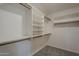 Walk-in closet featuring shelving for easy storage and organization to maximize space at 1610 W Maplewood St, Chandler, AZ 85286
