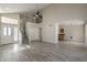 Spacious and bright living area featuring high ceilings, modern tile flooring, and an open layout at 1610 W Maplewood St, Chandler, AZ 85286