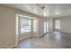 Sunlit living room with tile floors, large windows overlooking the pool, and a seamless flow to the outdoors at 1610 W Maplewood St, Chandler, AZ 85286