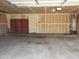 Spacious garage featuring ample storage space and access to the home at 1623 E Fremont Rd, Phoenix, AZ 85042