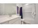 This bathroom offers a modern vanity with a tub-shower combo, perfect for everyday convenience at 16714 W Audrey Ln, Surprise, AZ 85387