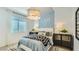 Cozy bedroom with a fun aesthetic, comfortable bed, and bright decor at 16739 W Charlotte Dr, Surprise, AZ 85387