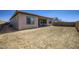 Backyard with potential for landscaping and outdoor living at 16933 W Bronco Trl, Surprise, AZ 85387