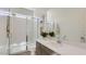 Modern bathroom featuring a sleek vanity, shower, and contemporary fixtures at 16933 W Bronco Trl, Surprise, AZ 85387