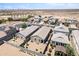Aerial view of neighborhood homes with desert landscaping and desert landscape at 31051 W Amelia Ave, Buckeye, AZ 85396